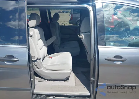 2010 Honda Odyssey Lx z USA, uszkodzony, nr VIN 5FNRL3H21AB059843